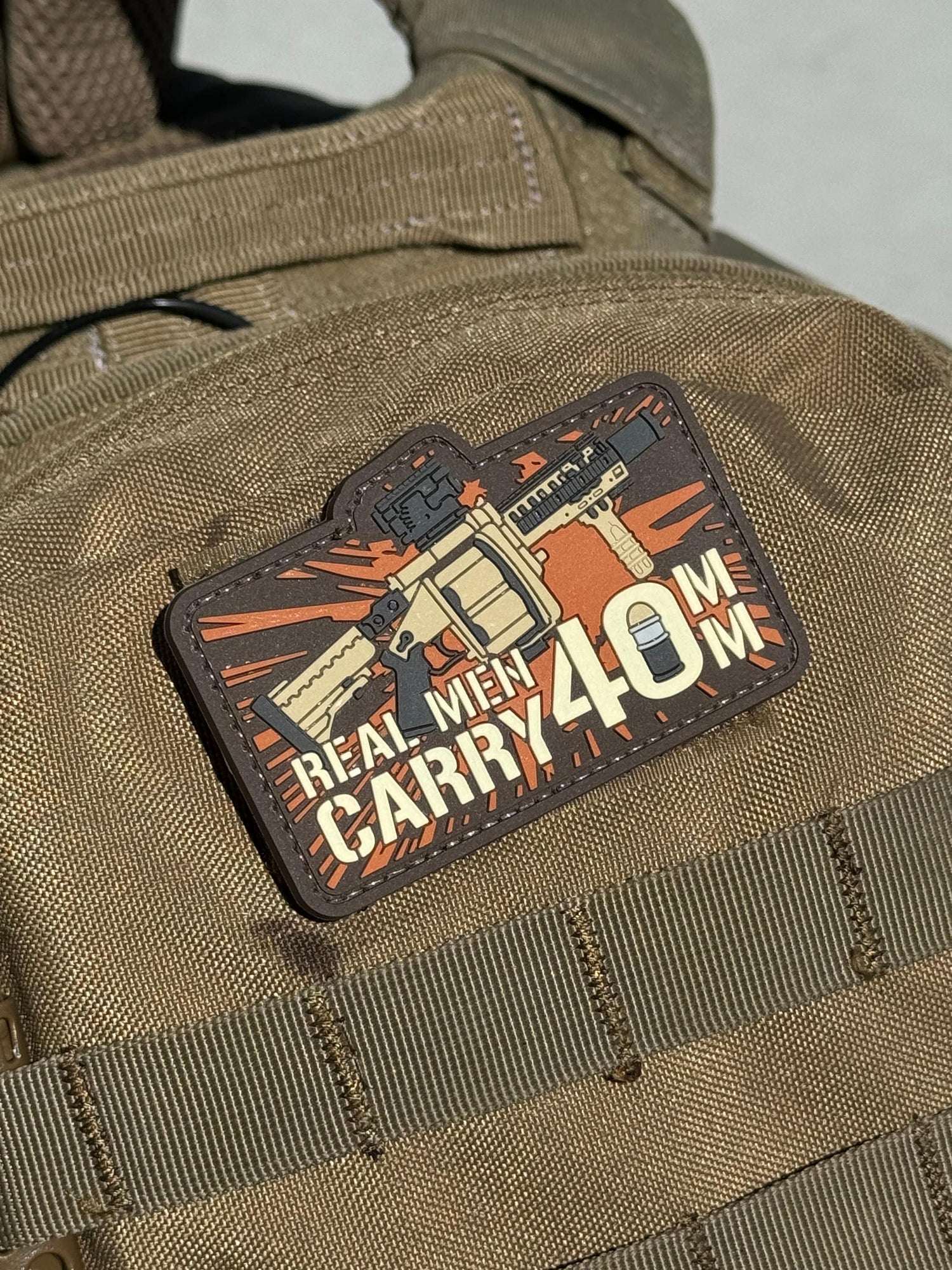 Real Men Carry 40MM... (PVC) Morale Patch